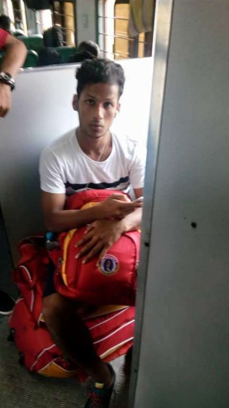 Narayan Das sits on top of make-shift seats near the toilets of a Kolkata-bound train. (Photo: Facebook)