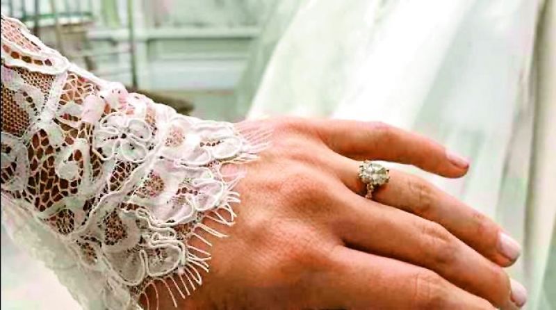 â€œI said yes to the dress,â€ wrote Bindi on Instagram along with a picture that showed off the white lace sleeve of her gown, as well as her custom nature-inspired engagement ring.