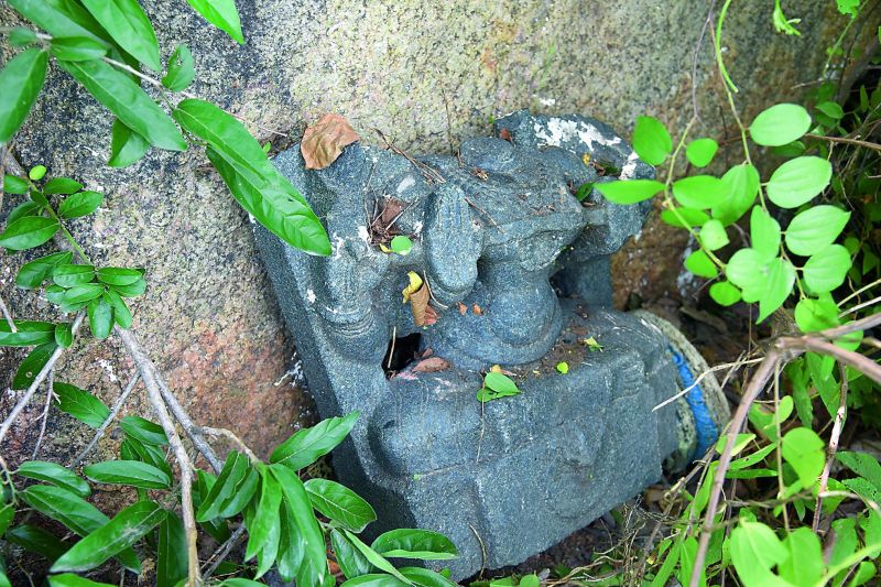 Witness to  vandalism: The mutilated bust of goddess Lakshmi lies in the temple premises. (Photo: DC)