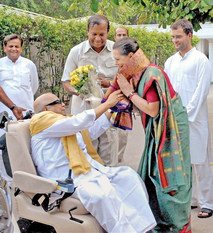 Offering shawl to Congress president Sonia Gandhi in Delhi.