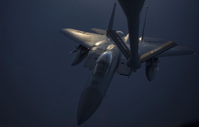 In this Sunday, May 12, 2019 photo released by the U.S. Air Force, an F-15C Eagle receives fuel from a KC-135 Stratotanker from the 28th Expeditionary Aerial Refueling Squadron, at an undisclosed location. The White House ordered the USS Abraham Lincoln aircraft carrier strike group and B-52 bombers to the Persian Gulf region on May 4. (Senior Airman Keifer Bowes, U.S. Air Force via AP) 
