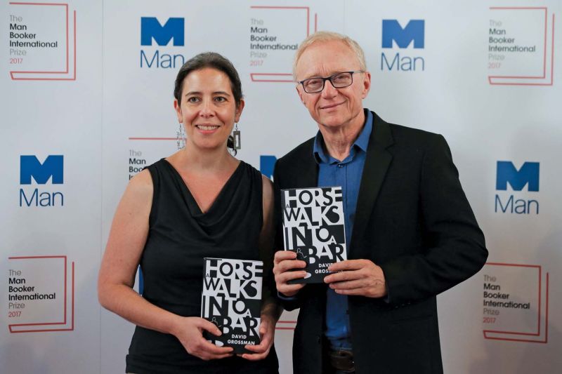 US translator Jessica Cohen and Israeli author David Grossman pose for a photograph with his book A Horse Walks Into a Bar at the shortlist photocall for the Man Booker International Prize, at St. James' Church in London. (Photo: AFP)