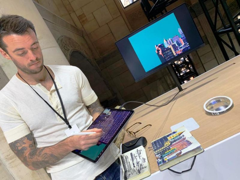 The USB-C port makes it easy for professionals to connect the iPad to bigger displays. Seen here is an artist showing his work live on a secondary display via the USB-C port.