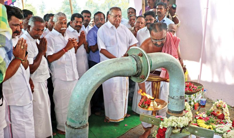 Pujas performed at the pumping station on Arasalar bank from where water is pumped to Mahamaham tank at Kumbakonam. R.Duraikannu, state agriculture minister and R.K.Bharathimohan, Mayiladuthurai MP are also seen.  