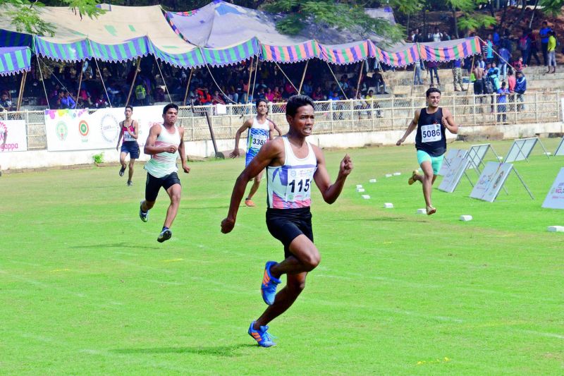 Boys participate in the finals of the 200 metre running race at the National Inter-District Junior Athletics Meet at Port Stadium in Vizag on Sunday.