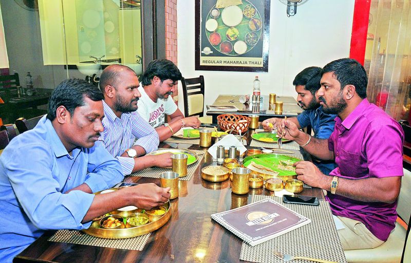 Happy customers savouring delicious millet-based recipes