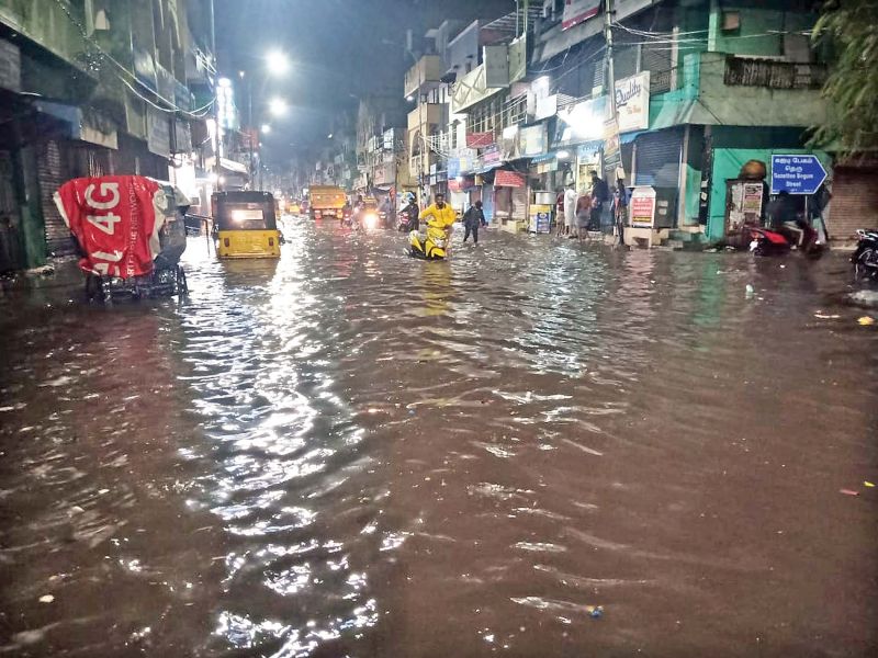 Heavy water-logging due to recent showers affects people on Dr Besant Road in Triplicane, Chennai, on Tuesday.  (Photo: DC)