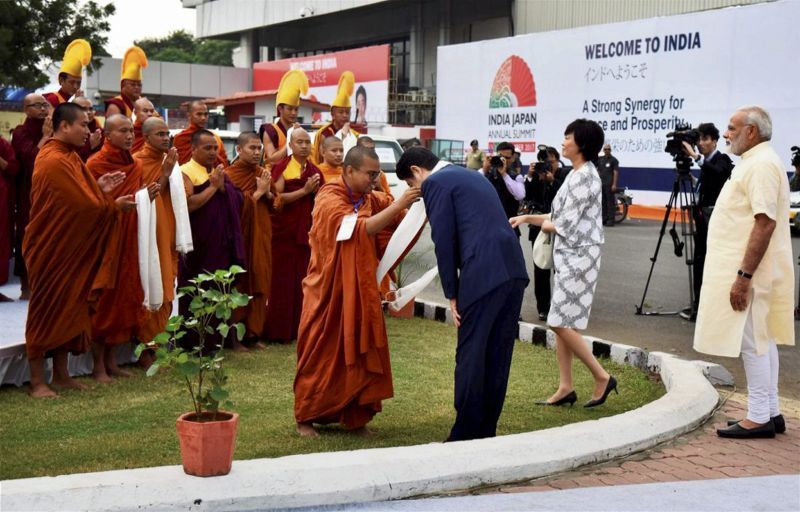 A group of Buddhist monks were also present to welcome Japanese PM Shinzo Abe. (Photo: PTI)