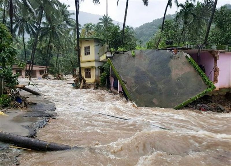 Roof of a house collapses following a flash flood, triggered by heavy rains, at Kodencheri in Kozhikode district of Kerala. (Photo: PTI)