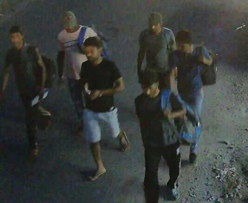The images of the suspects caught on CCTV cameras near the site of the offence.