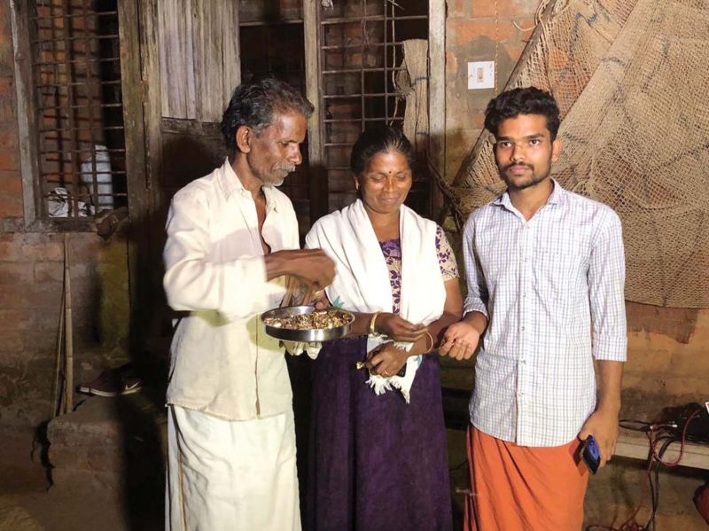 Suresh and Kamala, parents of Sreedhanya Suresh at their partially completed home at Wayanad. Brother Sreerag is also seen. 	â€”  Manu Damodar
