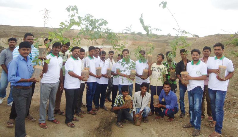 Members of the Green Army planting saplings as part of their afforestation campaign