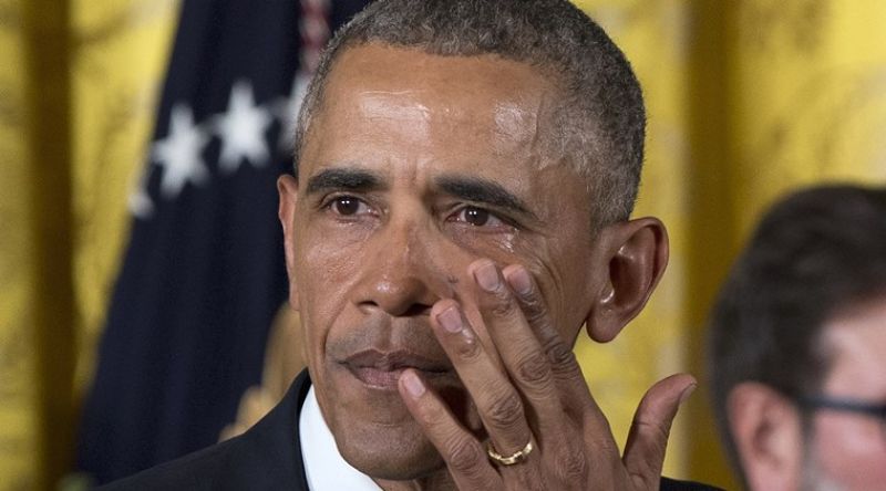 Barack Obama wipes a tear. (Photo: AP)