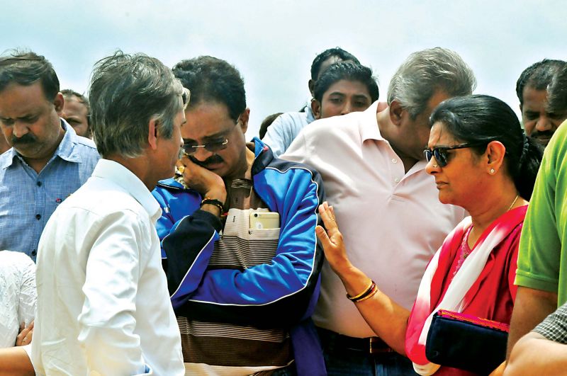 Sharath Kumar's parents and relatives at Manchanabele Dam, where the youngster's body was exhumed on Friday