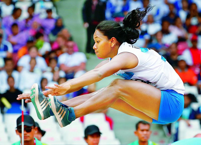 Swapna Barman in action during the women's heptathlon long jump event in Jakarta on Wednesday.  (Photo:AP)