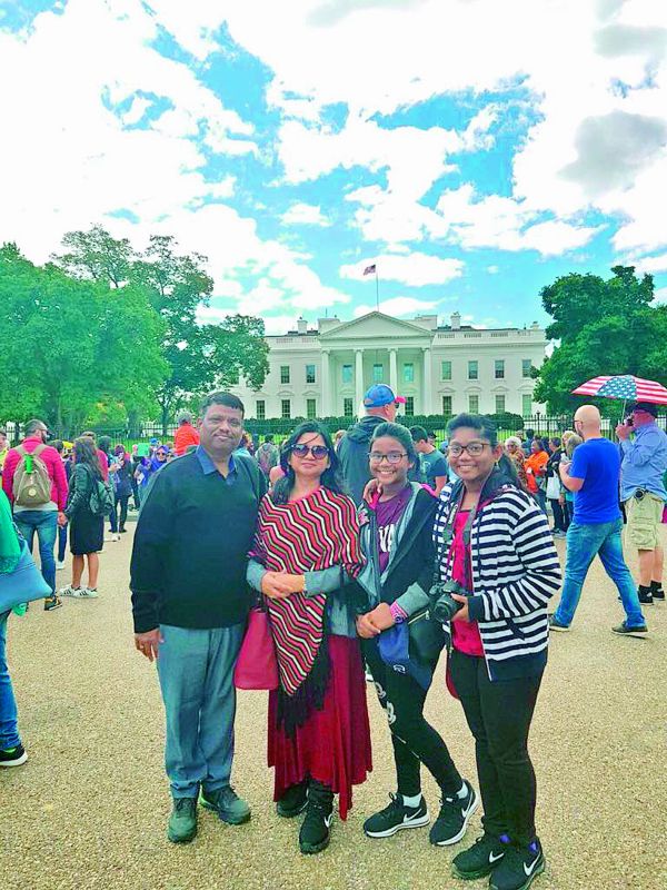 Swati Lakra with her husband and two daughters, Pratiti and Stuti.