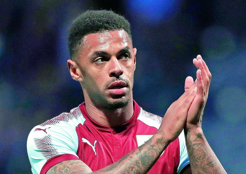 Footballer Andre Gray was banned for four games and fined after he had shared homophobic tweets