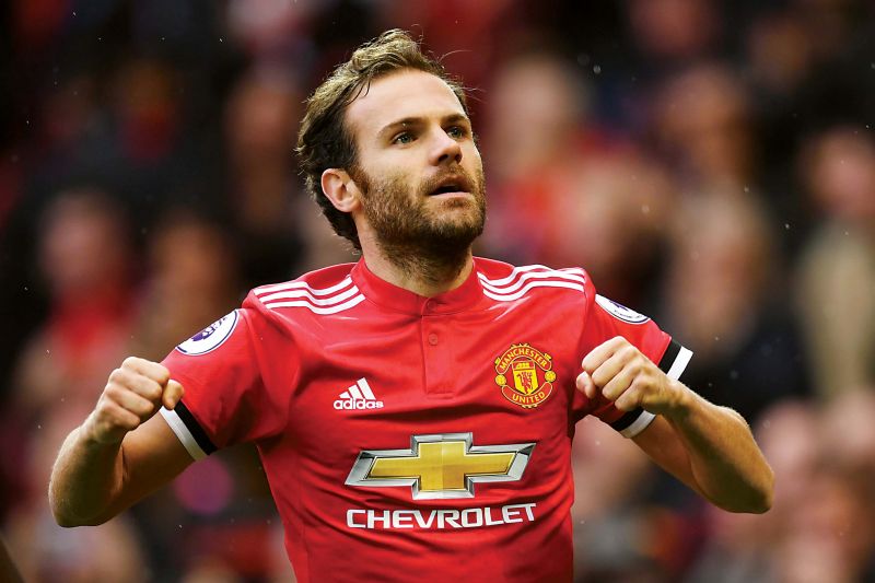 Manchester United's Juan Mata celebrates scoring the team's first goal during their EPL match against Crystal Palace at Old Trafford on Saturday. 	(Photo: AFP)