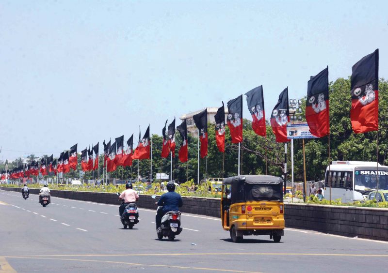 Flags of AIADMK fixed on medians in Chennai. (Photo: DC)