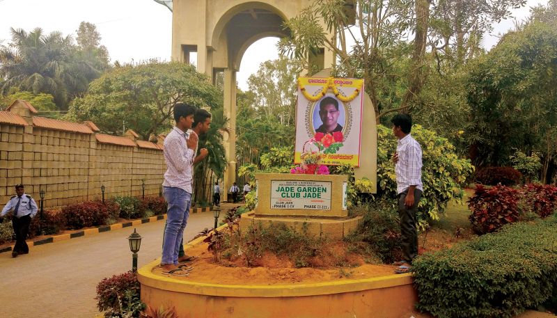 People pay their last respects to Major Akshay Girish Kumar outside his residence, in Bengaluru on Wednesday. (Photo: R. Samuel) 