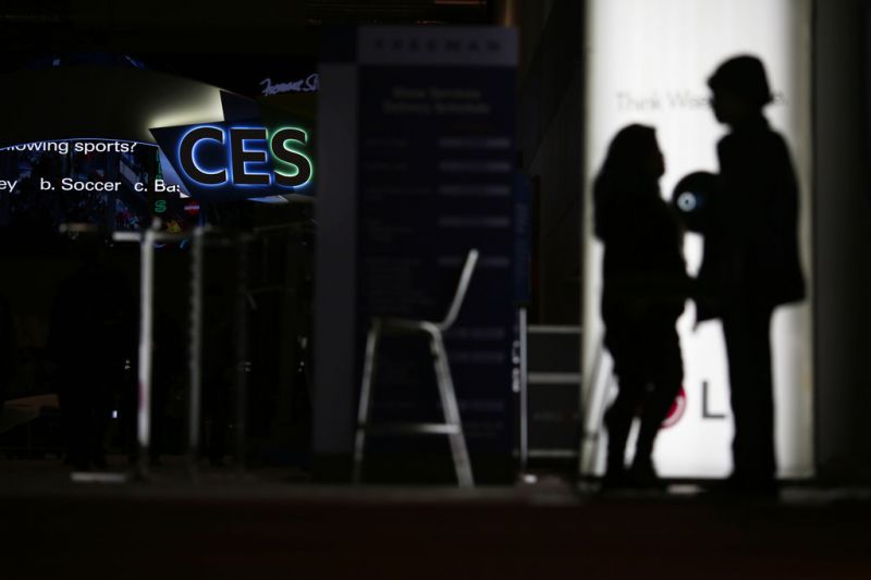 People walk around the Las Vegas Convention Center during preparations for CES International, Saturday, Jan. 5, 2019, in Las Vegas. The CES 2019 gadget show kicks off Sunday. (AP Photo/John Locher)