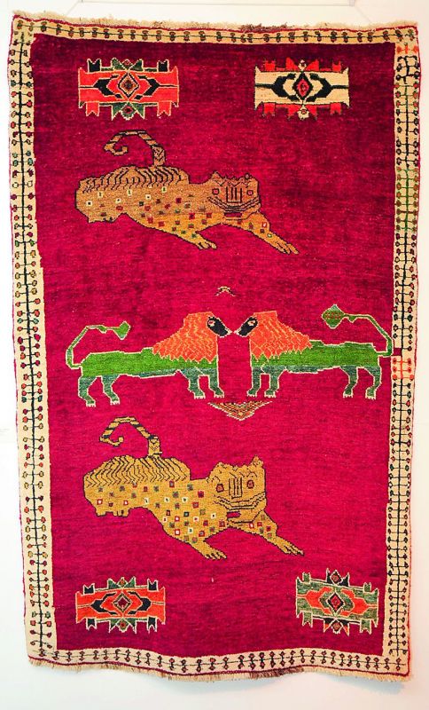 Lion on the edge: Weavers  highlighted wild animals on rugs