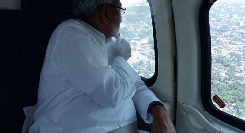 Bihar Chief Minister Nitish Kumar conducts aerial survey of flood affected areas. (Photo: ANI)