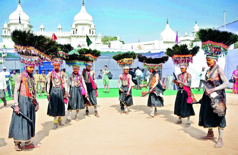 Folk artistes performing the Ghusadi dance form of Telangana