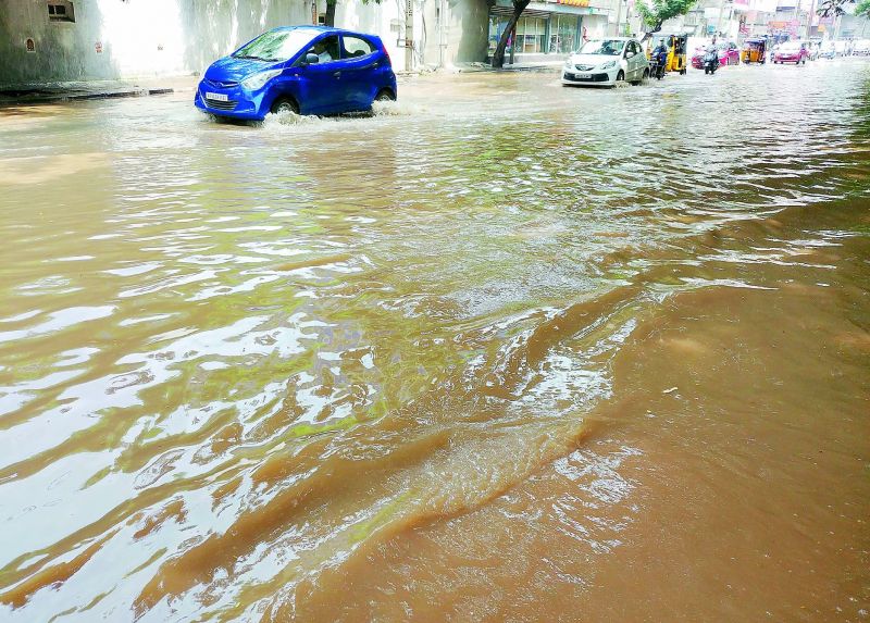 Basheerbagh road was submerged on Sunday. 	(Photo; DC)