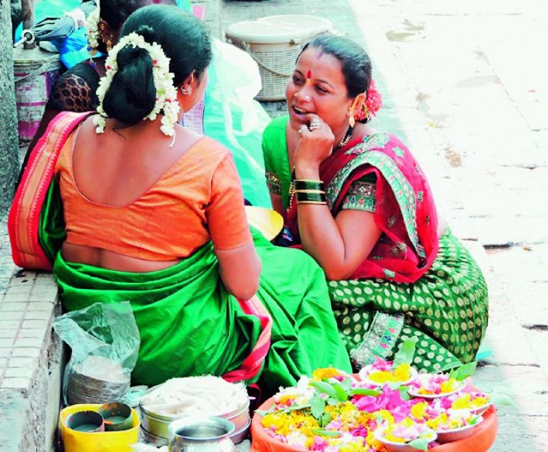 Women in conversation at the ghats of Nasik