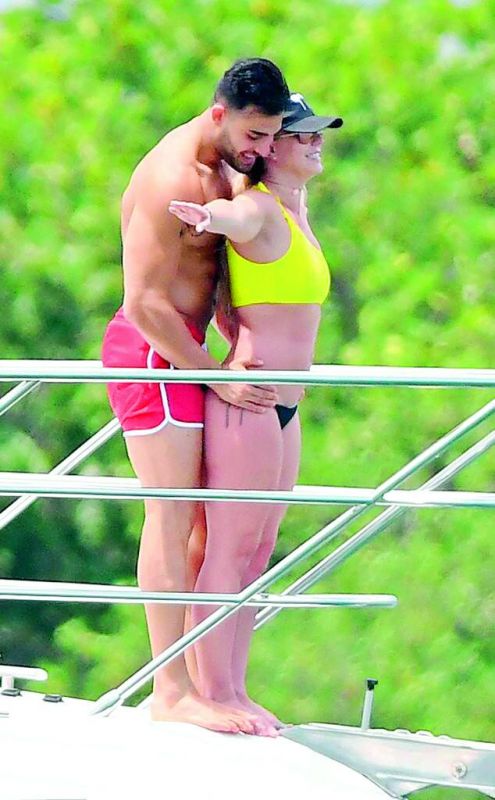 Britney Spears and her 25-year-old personal trainer beau Sam Asghari.
