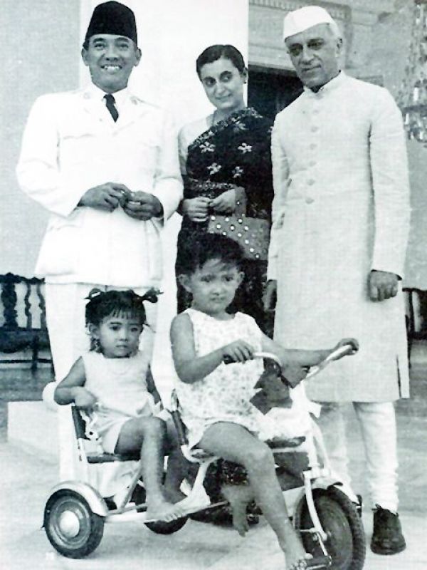 A file picture of Pandit Nehru with Indira Gandhi, sporting a traditional achkan, that he was often seen wearing