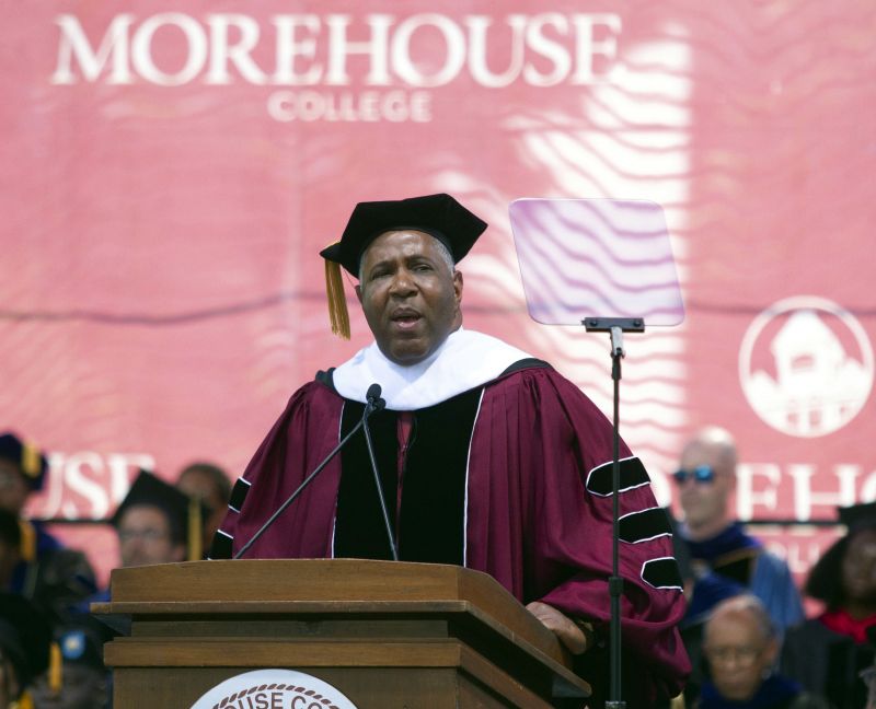 Billionaire technology investor and philanthropist Robert F. Smith announces he will provide grants to wipe out the student debt of the entire 2019 graduating class at Morehouse College in Atlanta, Sunday, May 19, 2019. (Steve Schaefer/Atlanta Journal-Constitution via AP) 