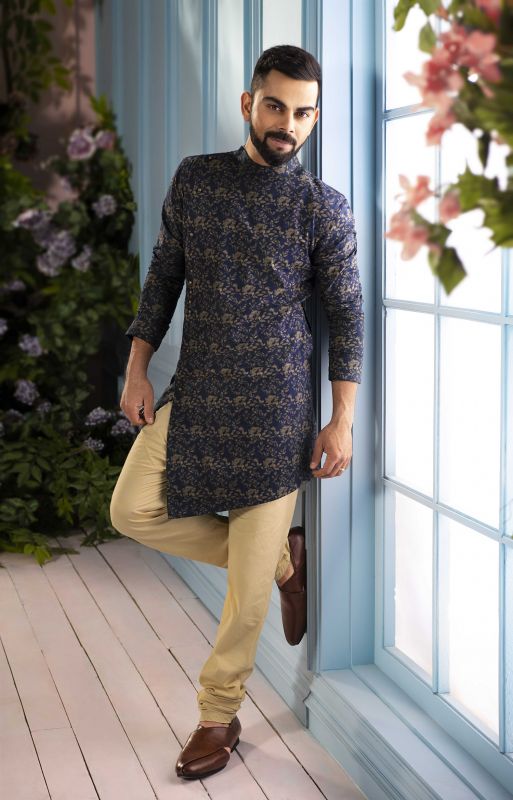 Kohli takes the trend-o-meter a nitch higher with asymmetrical cuts for Manyavar's 'India Ethnic Week' campaign for festive season.