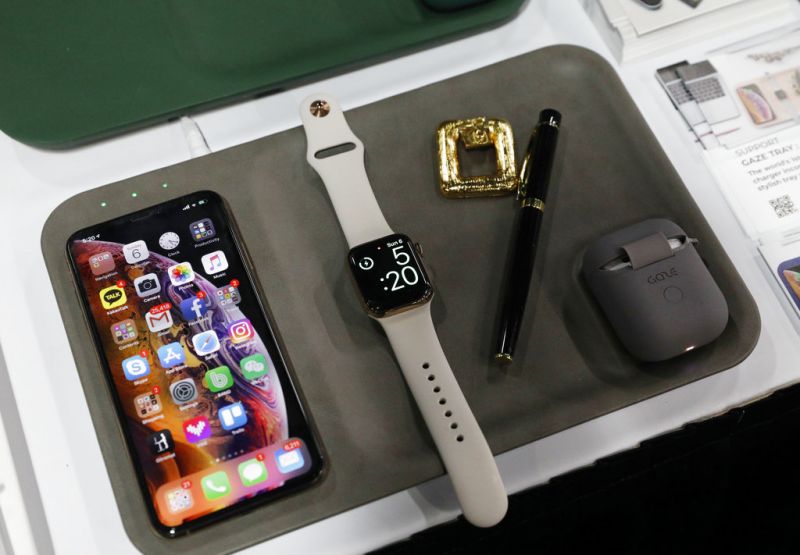 The Gaze Tray is on display at the Gaze Lab booth during CES Unveiled at CES International, Sunday, Jan. 6, 2019, in Las Vegas. The device can charge several types of devices at once. (AP Photo/John Locher)