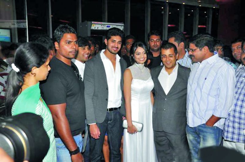  Why debutant Aravind Kumar (second from left) needed bouncers at his film's premiere is beyond anyone's imagination.