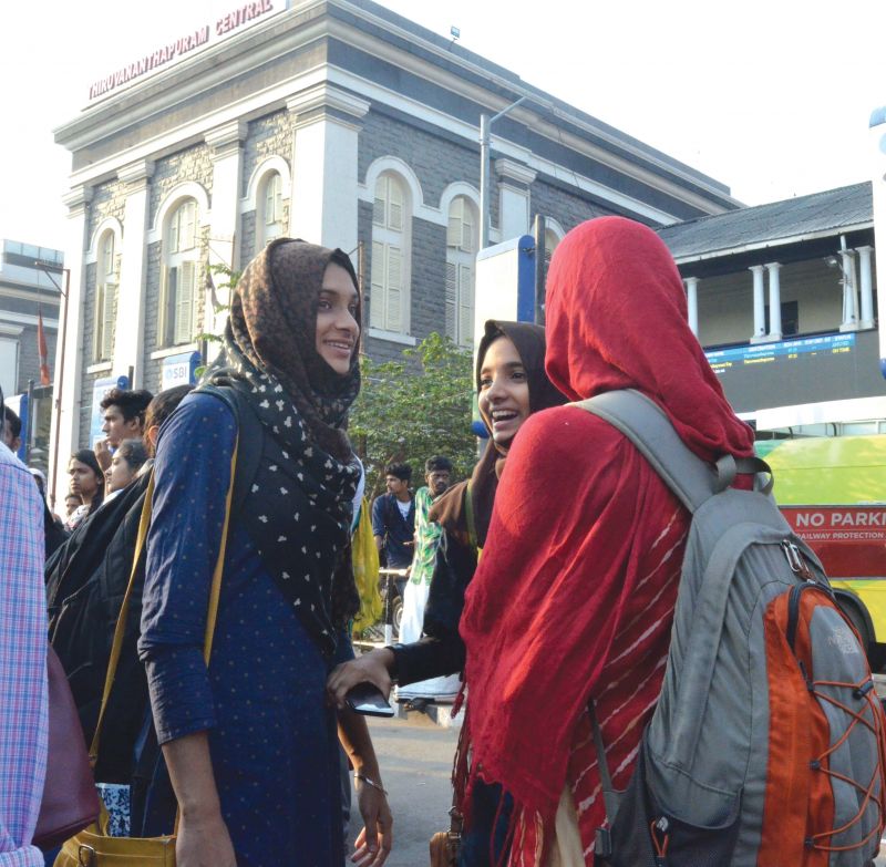 Medical students from Malappuram who have an examination on Tuesday wait for police bus in front of Thiruvananthapuram Central Railway station. 