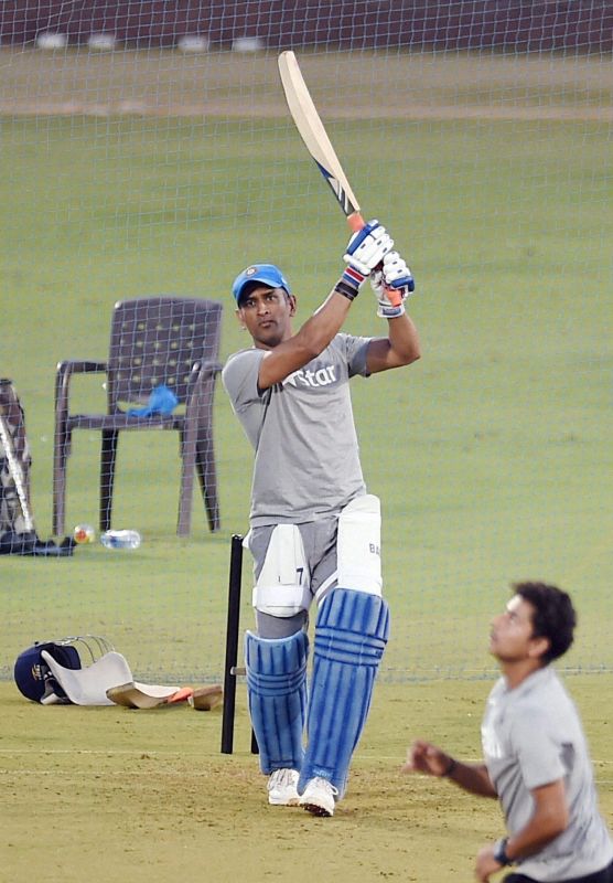 Mahendra Singh Dhoni smacks one out of the park during net practice, at the Brabourne Stadium in Mumbai, on Monday. (Photo: PTI)