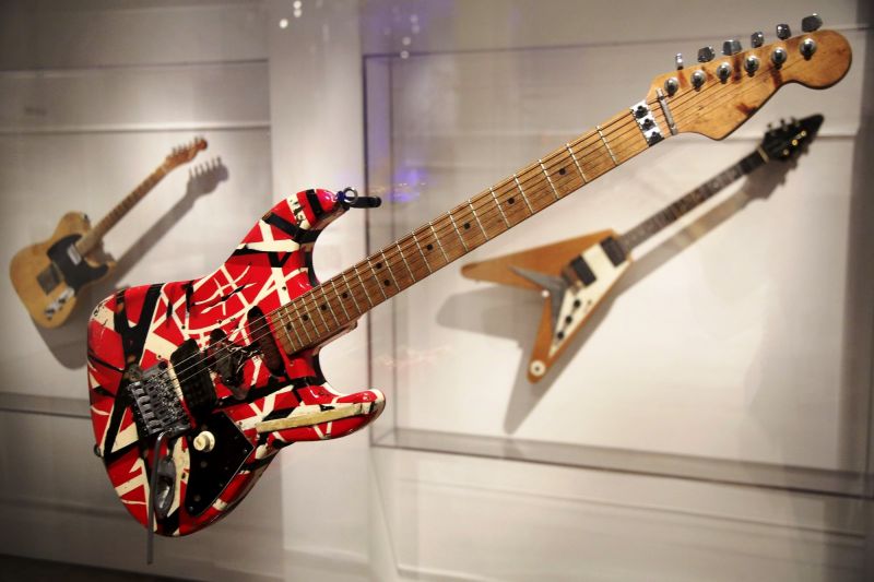 A guitar made and played by Eddie Van Halen of Van Halen is displayed at the exhibit. (Photo: AP)