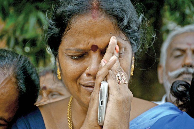 A lady breaks down as Jayalalithaa's health condition worsened on Monday.