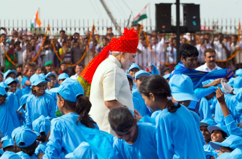 As Modi proceeded to leave the 17th century monument after concluding his Independence Day address in 2014, he stopped his motorcade midway and reached out to the children. (Photo: AP)
