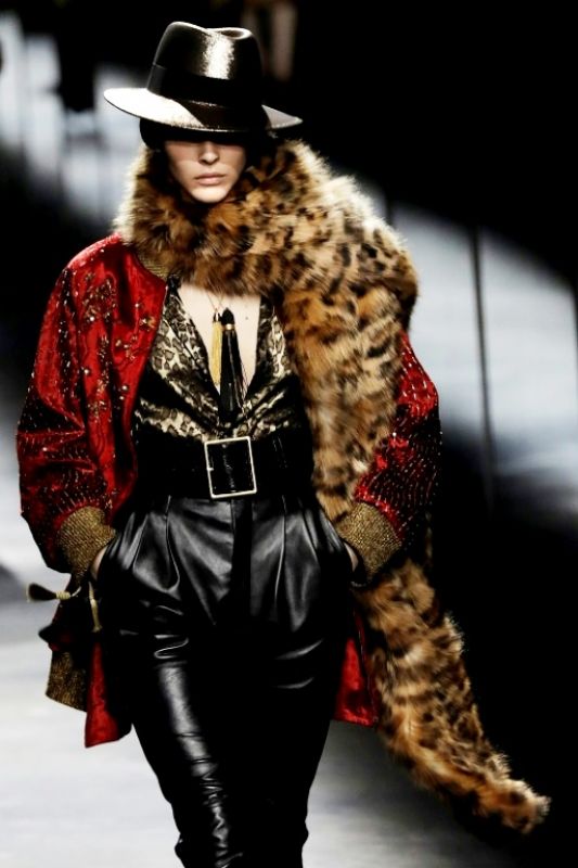 Saint Laurent topped many of its looks with shiny silky fedoras. (Photo: AFP)