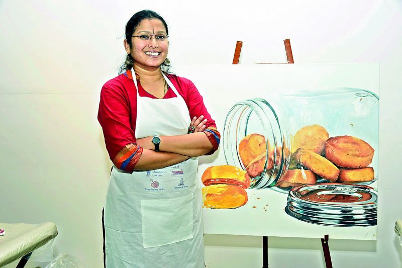 Dr. B Kumudini with her artwork