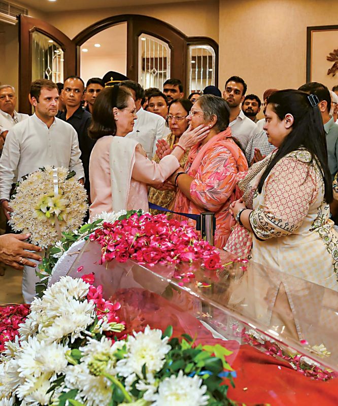 Congress president Sonia Gandhi consoles Arun Jaitleyâ€™s wife as party leader Rahul Gandhi looks on, in New Delhi on Saturday 	â€” PTI