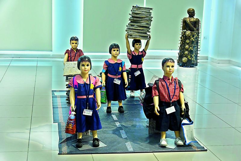 Tirumala Thirupathi's art installation about overburdening children with heavy books.