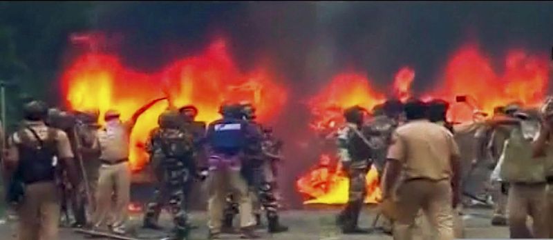 Vehicles burn during arson following Dera Sacha Sauda chief Gurmeet Ram Rahim's conviction in Panchkula on Friday. (Photo: PTI)