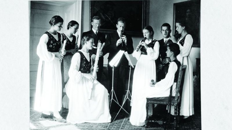 The Von Trapp children practising their music in 1938. The bespectacled gentleman is the family priest, Franz Wasner. (Credit-Salzburg Museum)