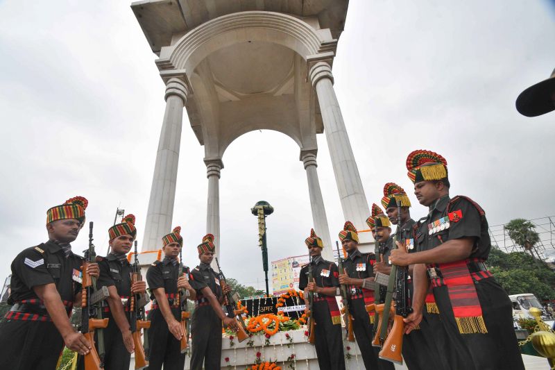  Army soldiers pay gun salute at Shaheed-e-Kargil memorial as part of Kargil Vijay Diwas celebrations, in Patna on Thursday. (Photo: PTI)