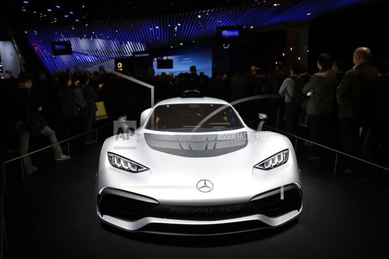 The Mercedes-AMG Project One plug-in hybrid supercar appears on display.