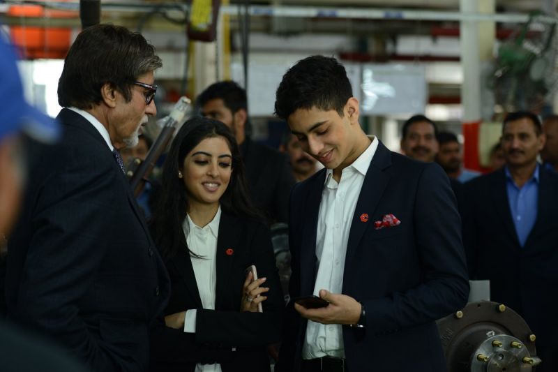 Amitabh Bachchan works' at son-in-law's factory, meets grandchildren